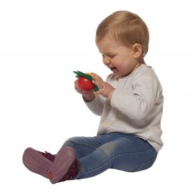 León que gira la peonza del bebé