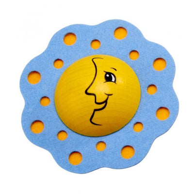 Luna que gira la peonza del bebé