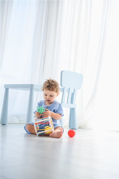 Juego sensorial de empujar y rodar