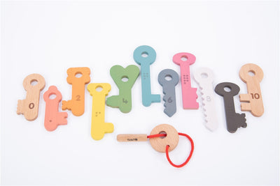 Llaves madera arco iris para enhebrar 12 pzas.