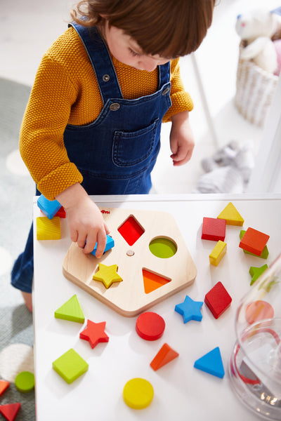 Tablero motricidad Carrusel de formas